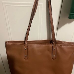 Coach medium brown leather tote.  Brand new no tags but never used